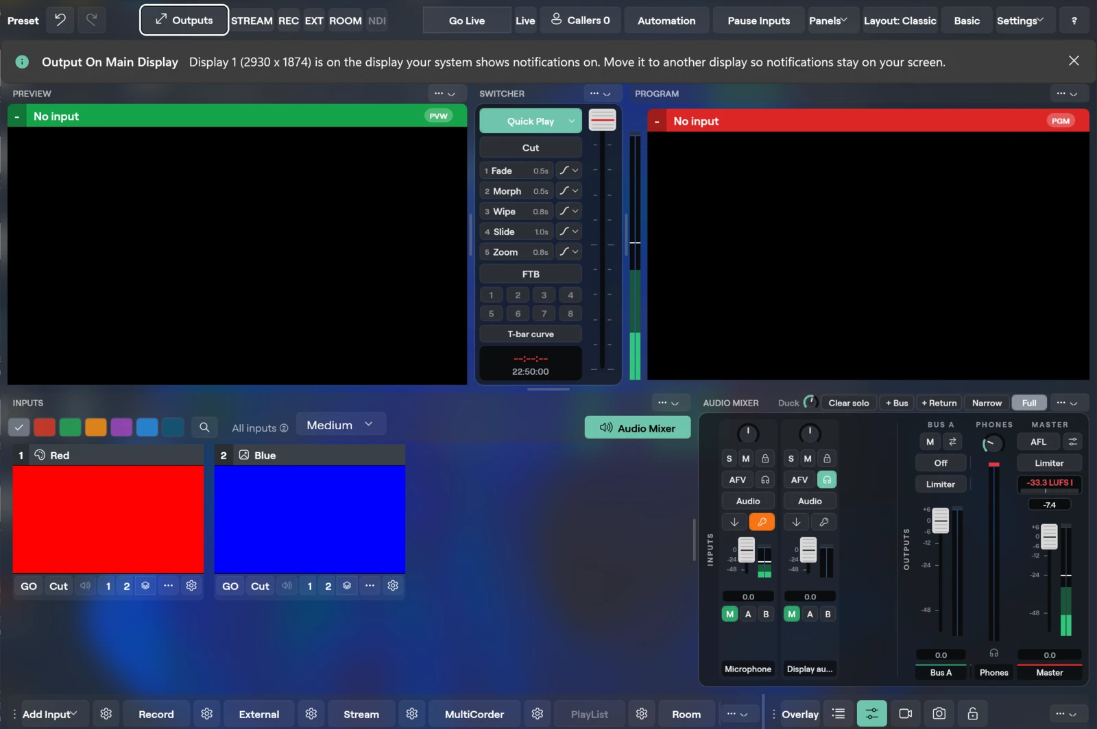 The Studio window on Windows with the Output On Main Display notice in its own bar above the Preview, Switcher and Program monitors