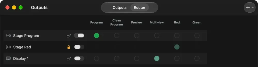 The Outputs window in dark mode, Router view, routing Stage Program, Stage Red and Display 1 to different sources