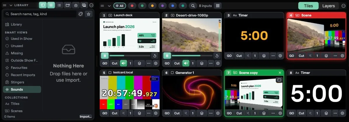 The Studio library with smart views and a grid of eight input tiles: slides, video, timers, scenes, a web page and a generator