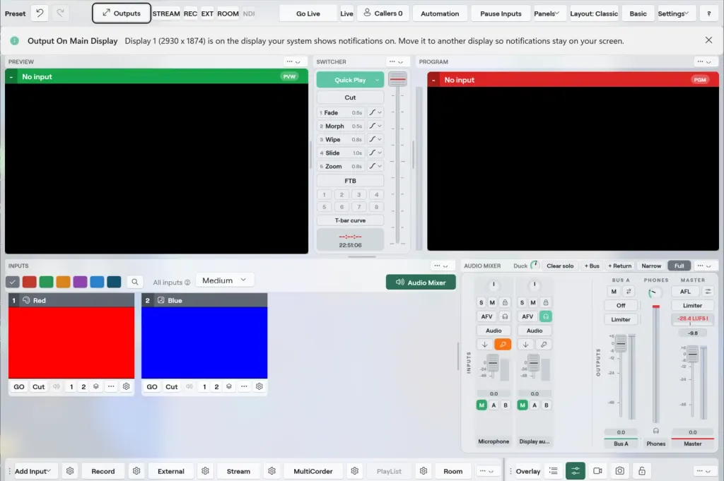 The Studio window on Windows with the Output On Main Display notice in its own bar above the Preview, Switcher and Program monitors